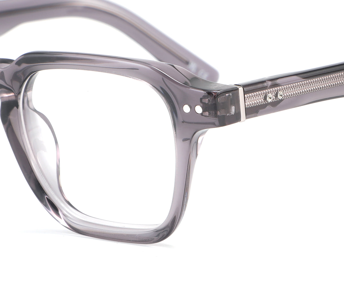Close-up of a gray eyeglasses frame on a white background