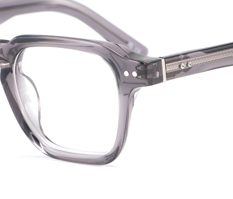 Close-up of a gray eyeglasses frame on a white background