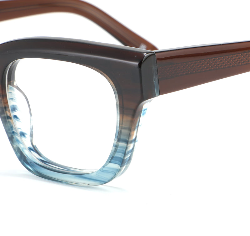Close-up of a pair of eyeglasses with a brown frame and blue-tinted lenses on a white background.